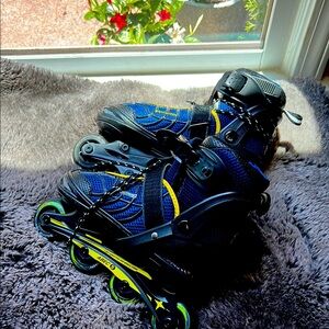 Blue and Black Inline Skates with Adjustable Straps and Ventilation